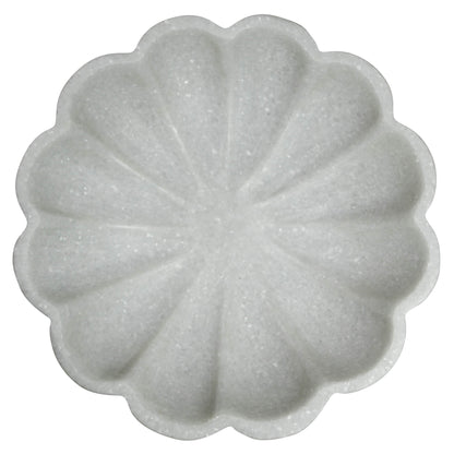 Shallow scalloped marble bowl with soft grey veining