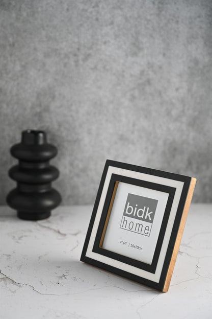 Line Frame, Black & White by BIDKhome — 4 × 4 on a shelf
