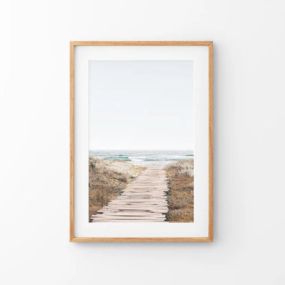 Beach pathway print in a thin wood frame with mat — boardwalk through dunes to the sea