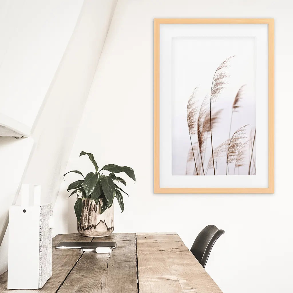 Beige dried grass print in an oak frame with a wide white mat