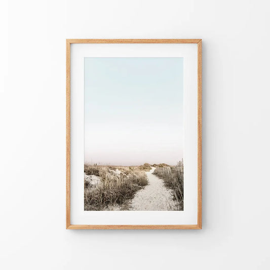 Sand path through dune grass, framed in thin oak with a mat