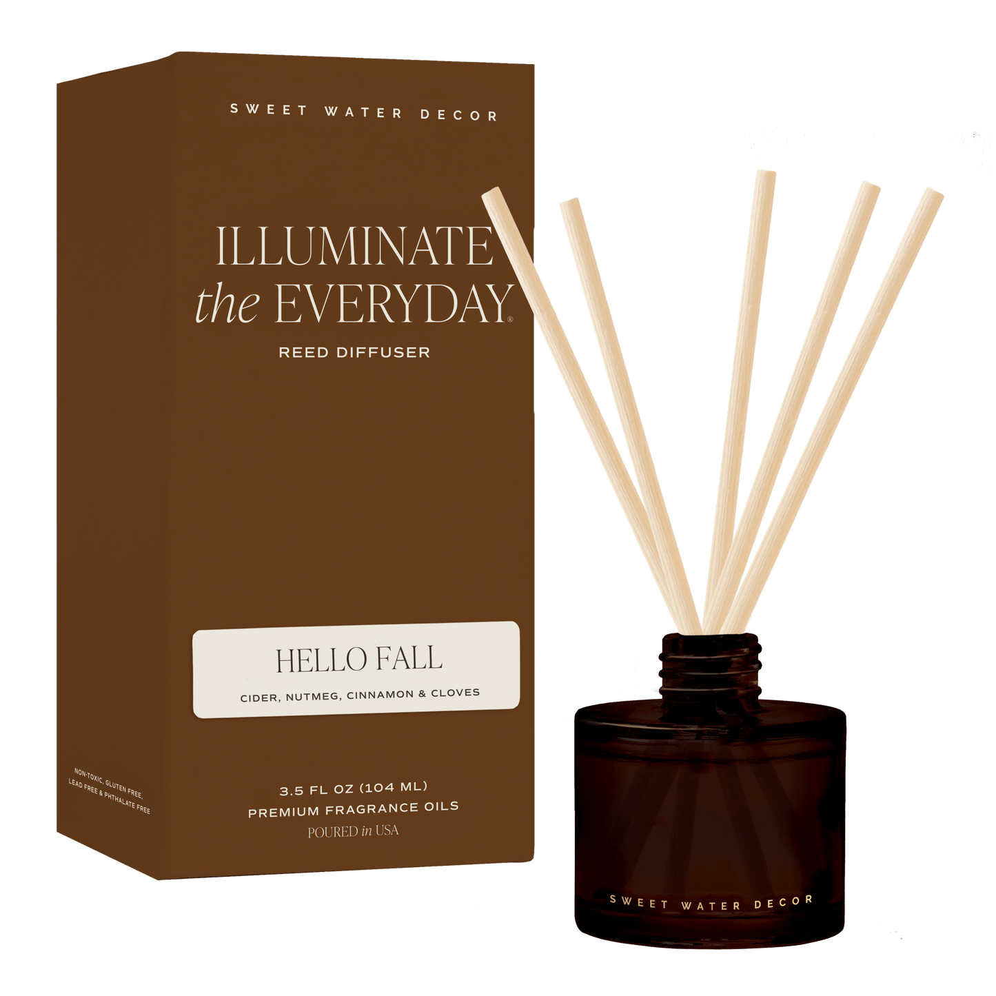 Hello Fall reed diffuser with pale reeds in an amber glass jar beside its brown box