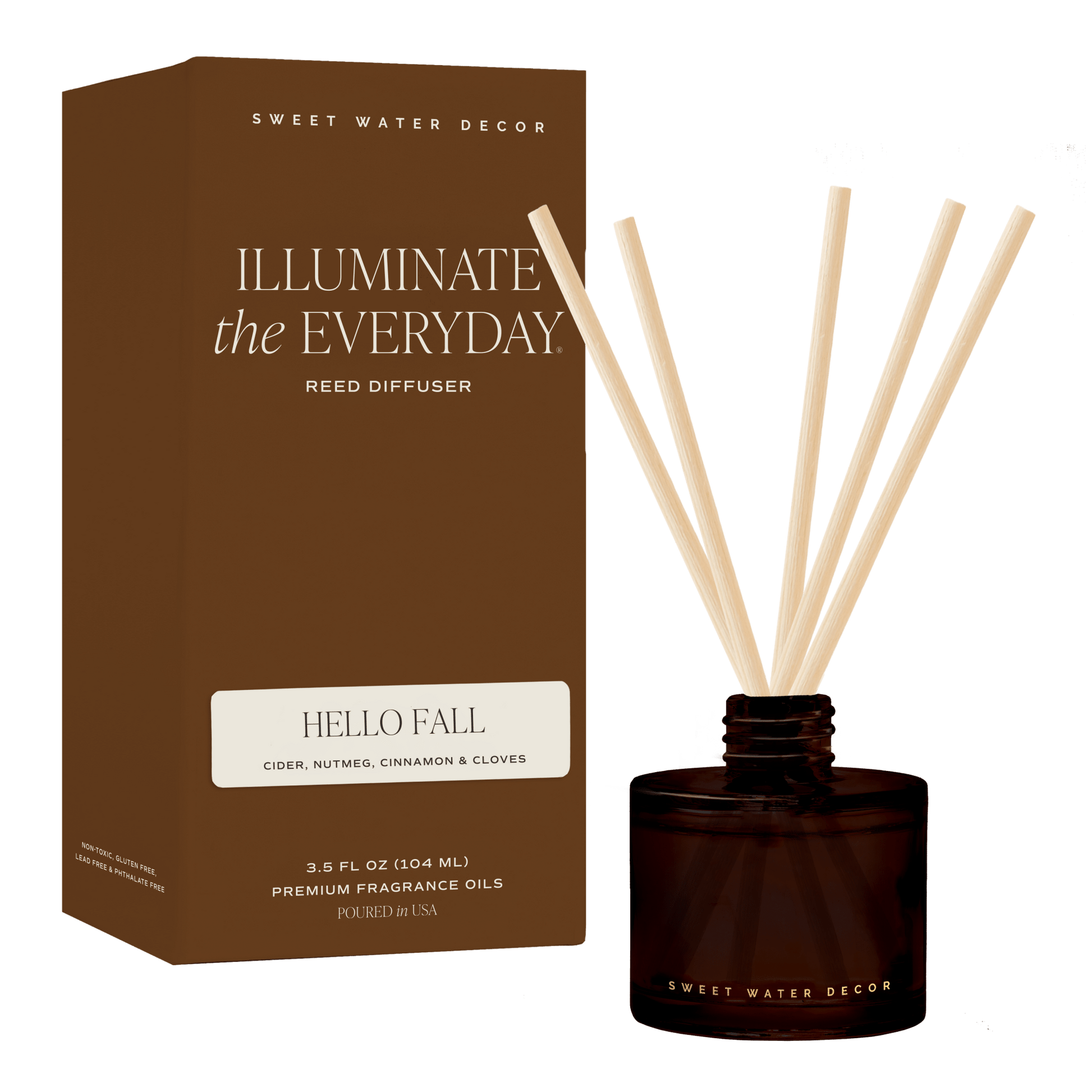 Hello Fall reed diffuser with pale reeds in an amber glass jar beside its brown box