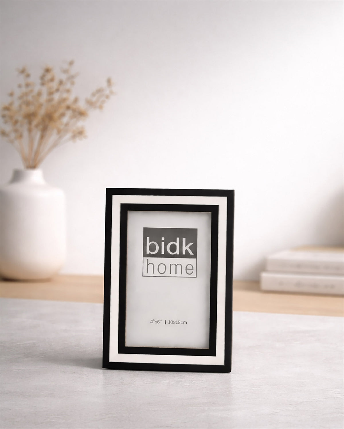 Line Frame, Black & White by BIDKhome — 4 × 6 on a shelf