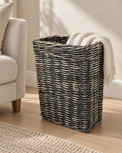 Lazaro Basket — Black Wash in a styled living room beside an ivory chair